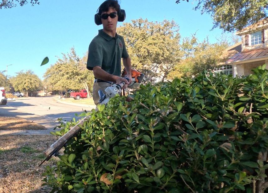 The Howdy Lawn Care team